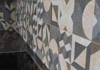 Укладка керамогранита на кухонном фартуке на индустриальном пр. 1