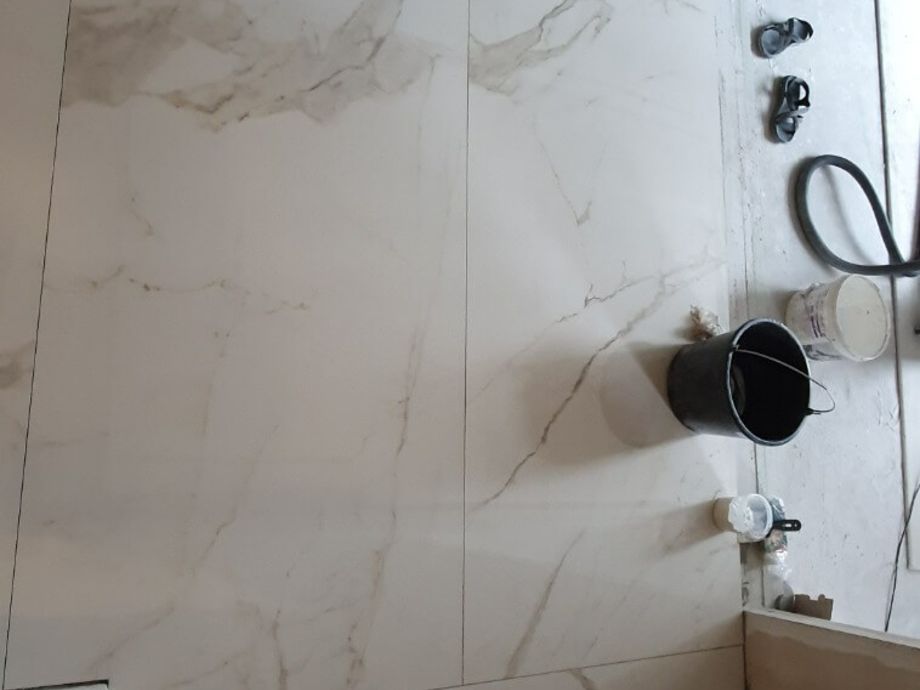 Укладка крупноформатного керамогранита на пол на Аптекарском пр. 4